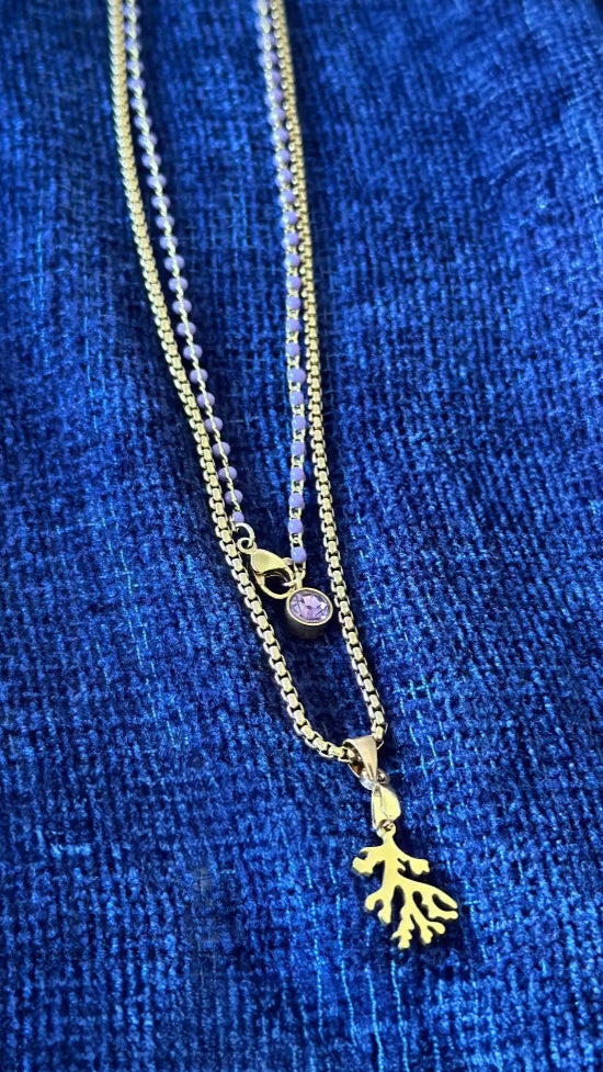 "The gold coral pendant is stunning, and the mauve resin pearl necklace with the Amethyst charm feels magical. I love layering them — so unique and vibrant!" ✧ YANA