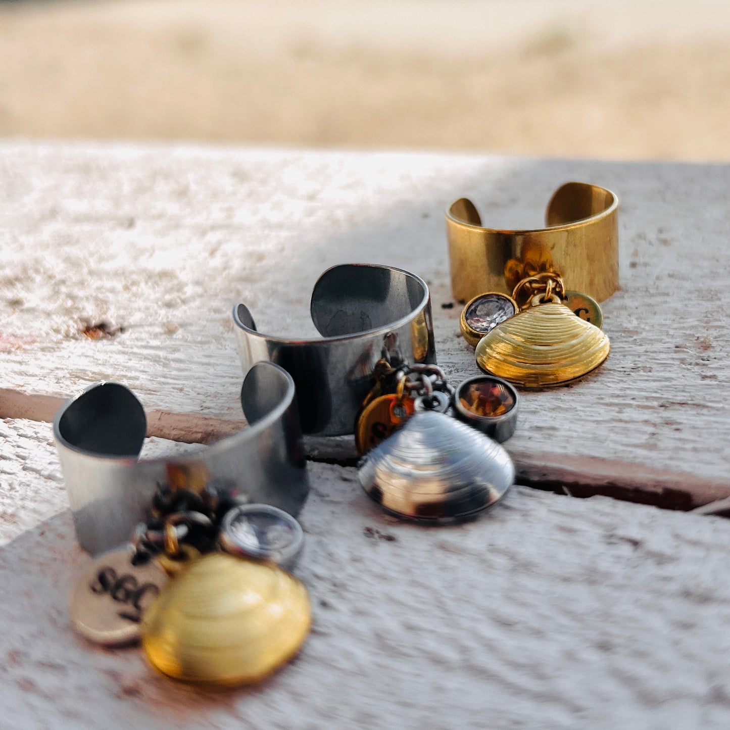 Collection of rings with Tec Tec and birthstone charms