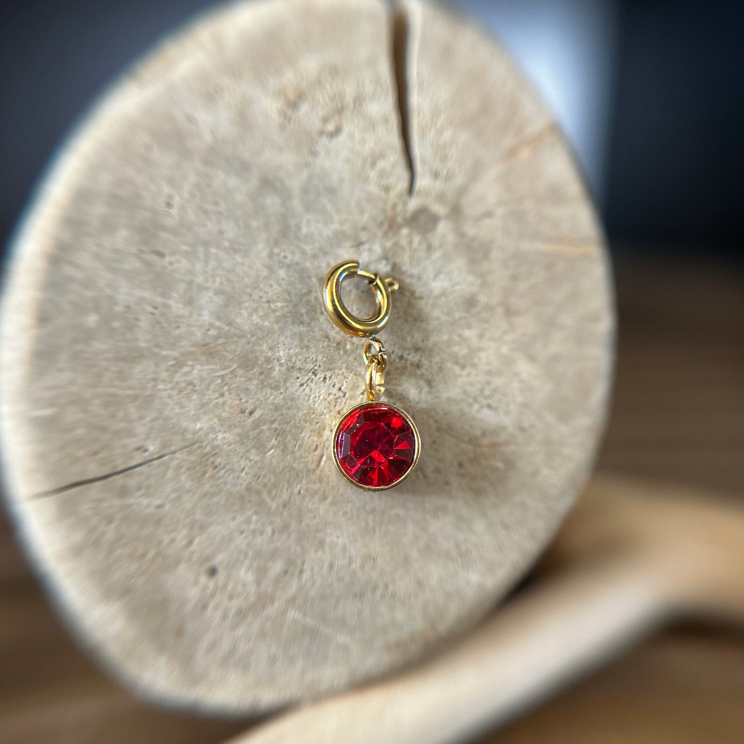 9 ◦ Rs150 ◦ Birthstone 6mm (Golden)