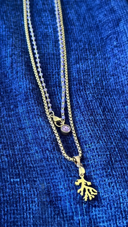 "The gold coral pendant is stunning, and the mauve resin pearl necklace with the Amethyst charm feels magical. I love layering them — so unique and vibrant!"  ✧  YANA