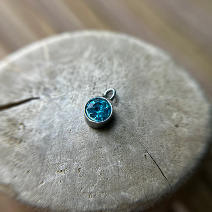 9 ◦ Rs150 ◦ Birthstone 6mm (Silver)
