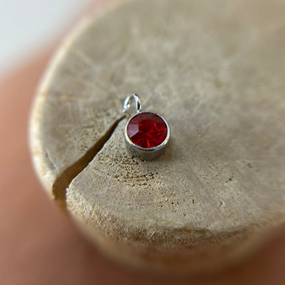 9 ◦ Rs150 ◦ Birthstone 6mm (Silver)